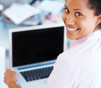 Principles Woman Holding a Laptop