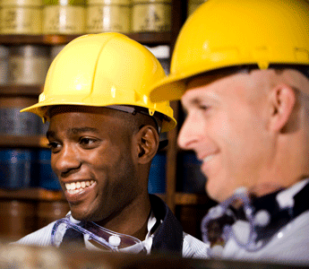 Two Male Employees Wearing Safety Gear